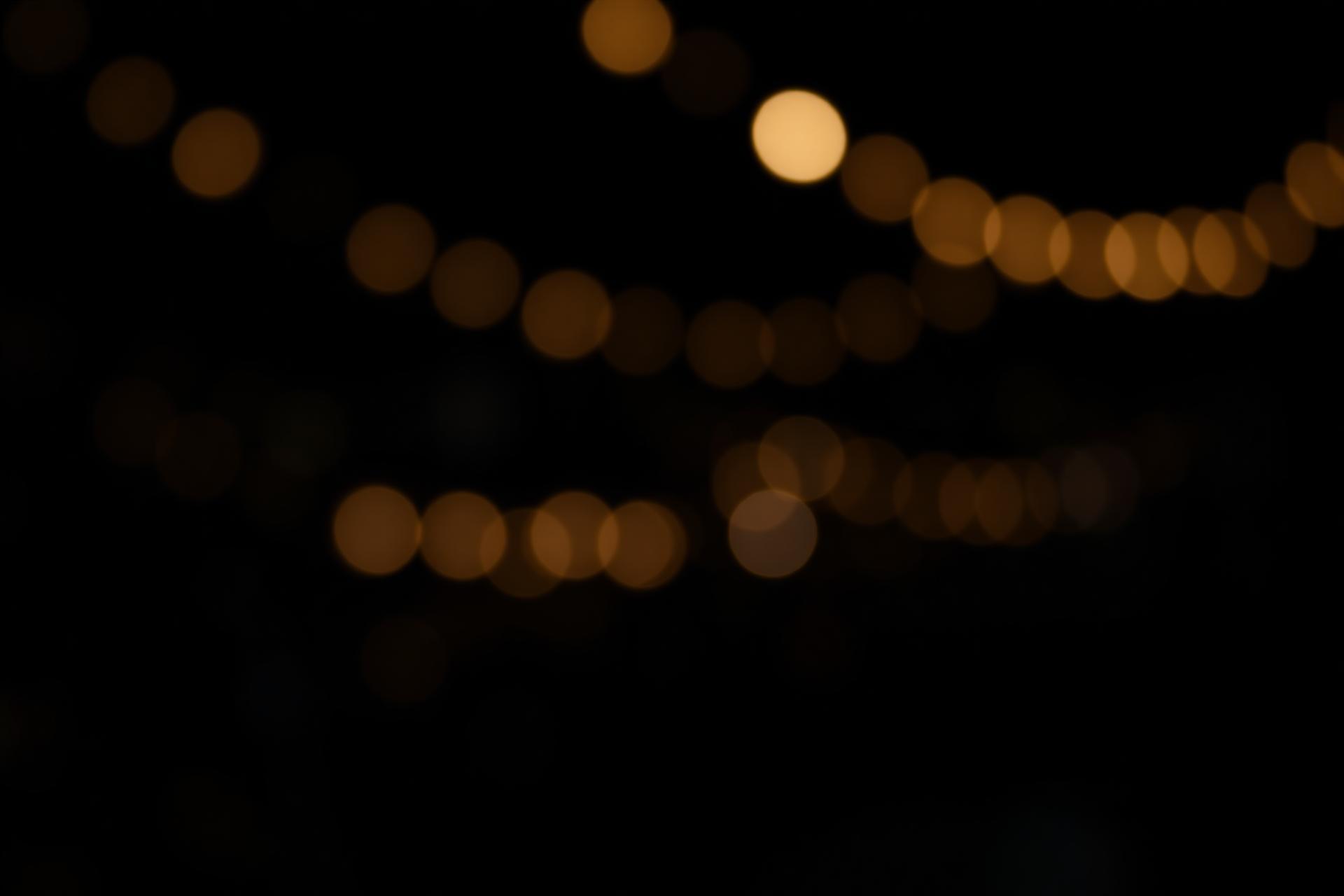 Oakland evening skyline with warm interior lighting